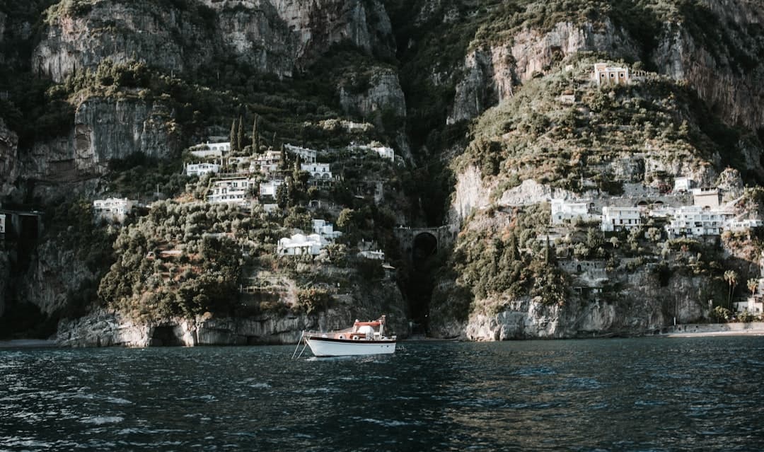 white motorboat on body of water - Photo by Ryan James Christopher on Unsplash